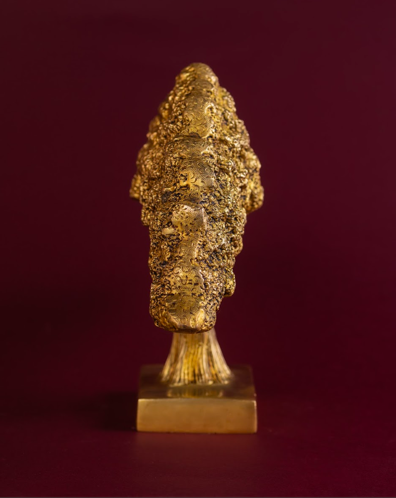 Rear view of brass Banyan Tree sculpture emphasizing sculpted branch structure