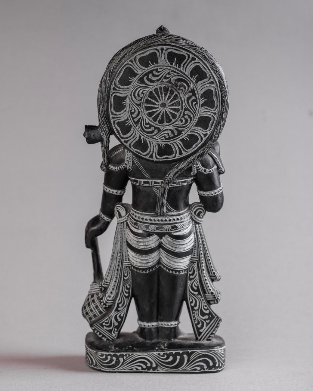 Rear view of black stone Hanuman statue showing sculptural depth and polished finish buy now
