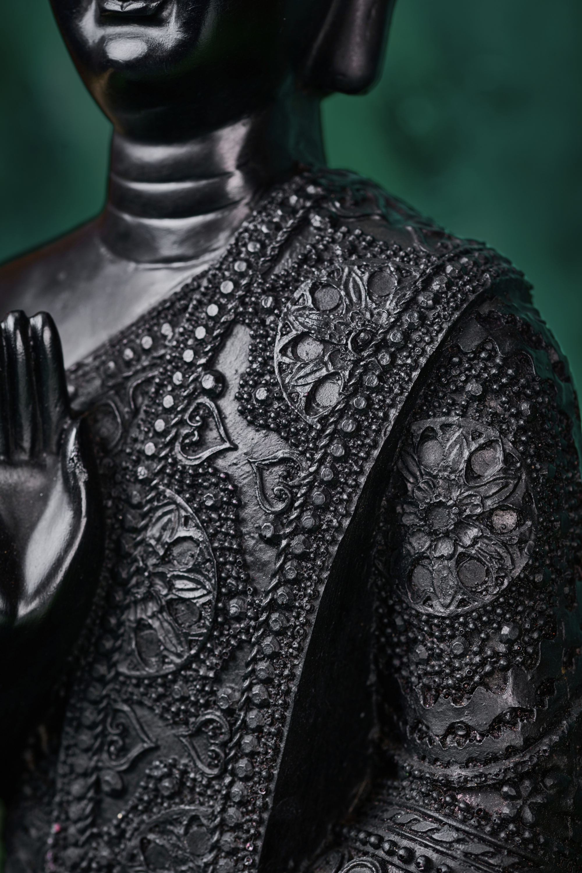 Black wood Buddha meditation statue created to bring balance, stillness, and spiritual harmony to interiors