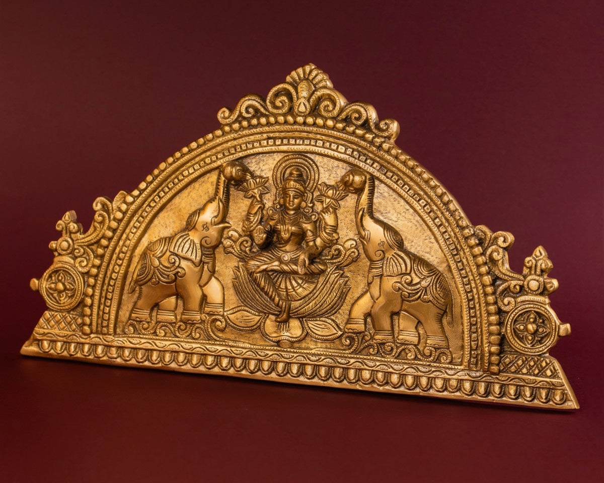 brass plaque of Lakshmi with elephants