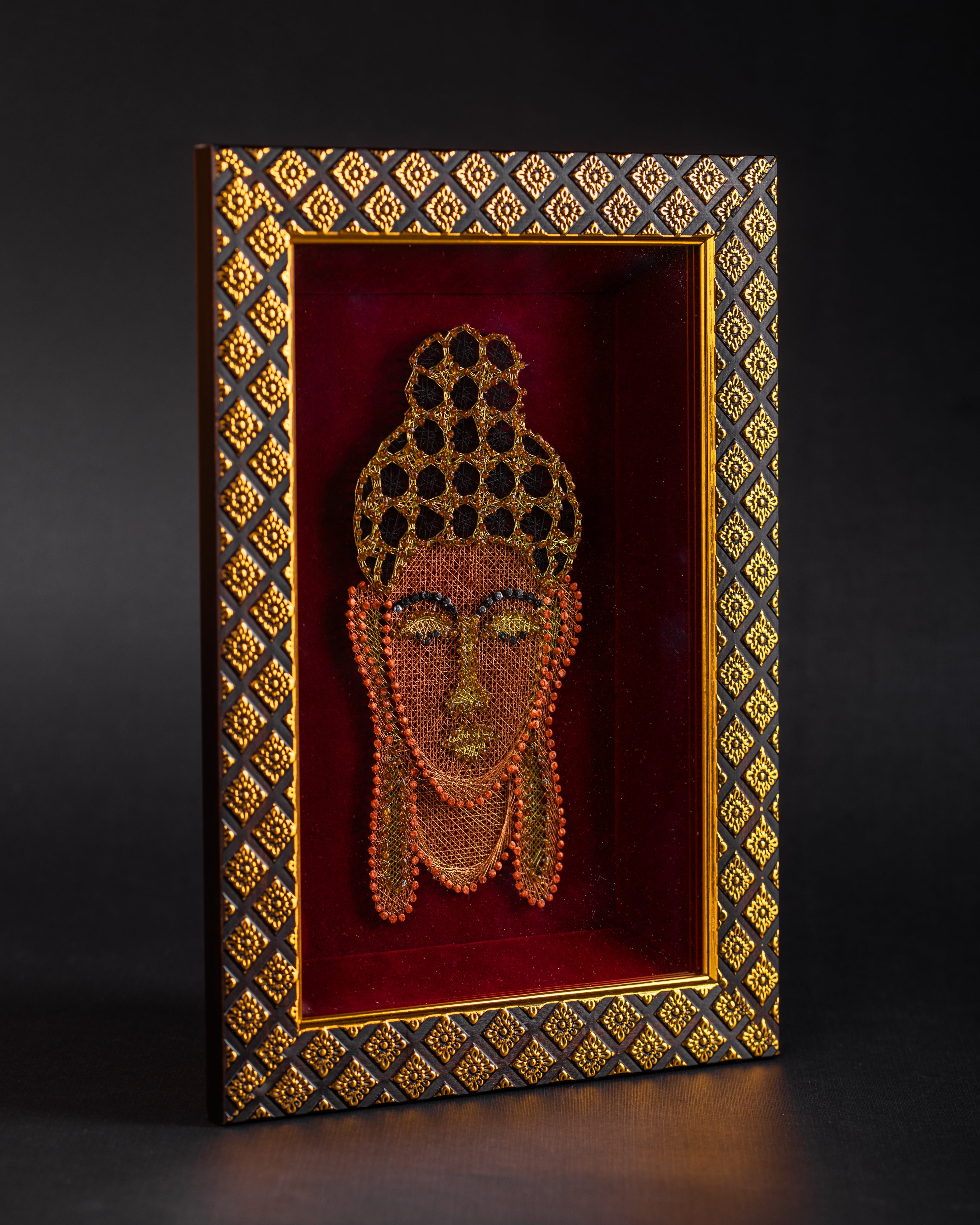 Handcrafted Buddha Zardozi artwork shown from the front with ornate frame