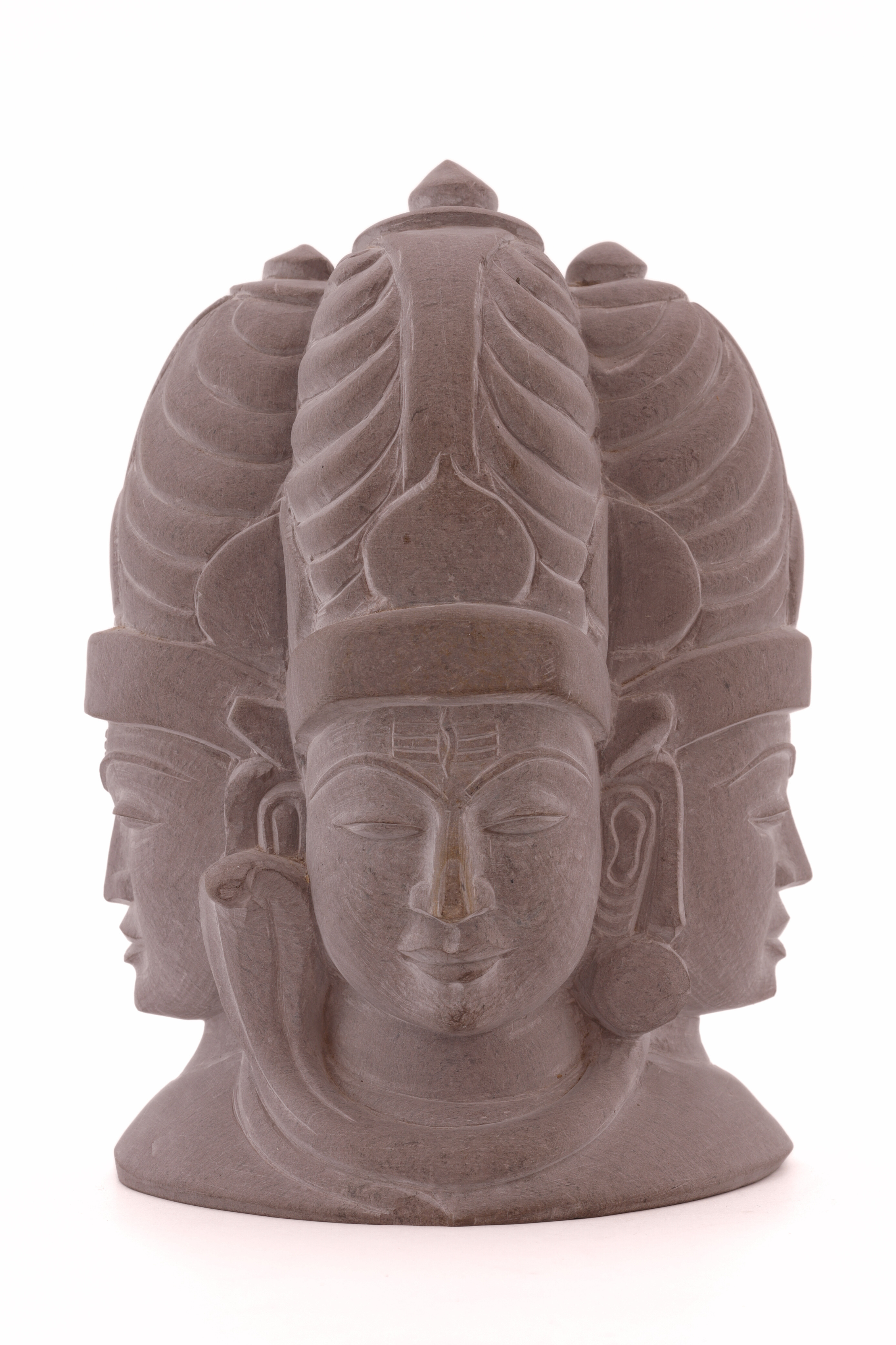 Hindu Shiva trinity sculpture crafted in natural stone, showcasing sacred symbolism and refined traditional artistry