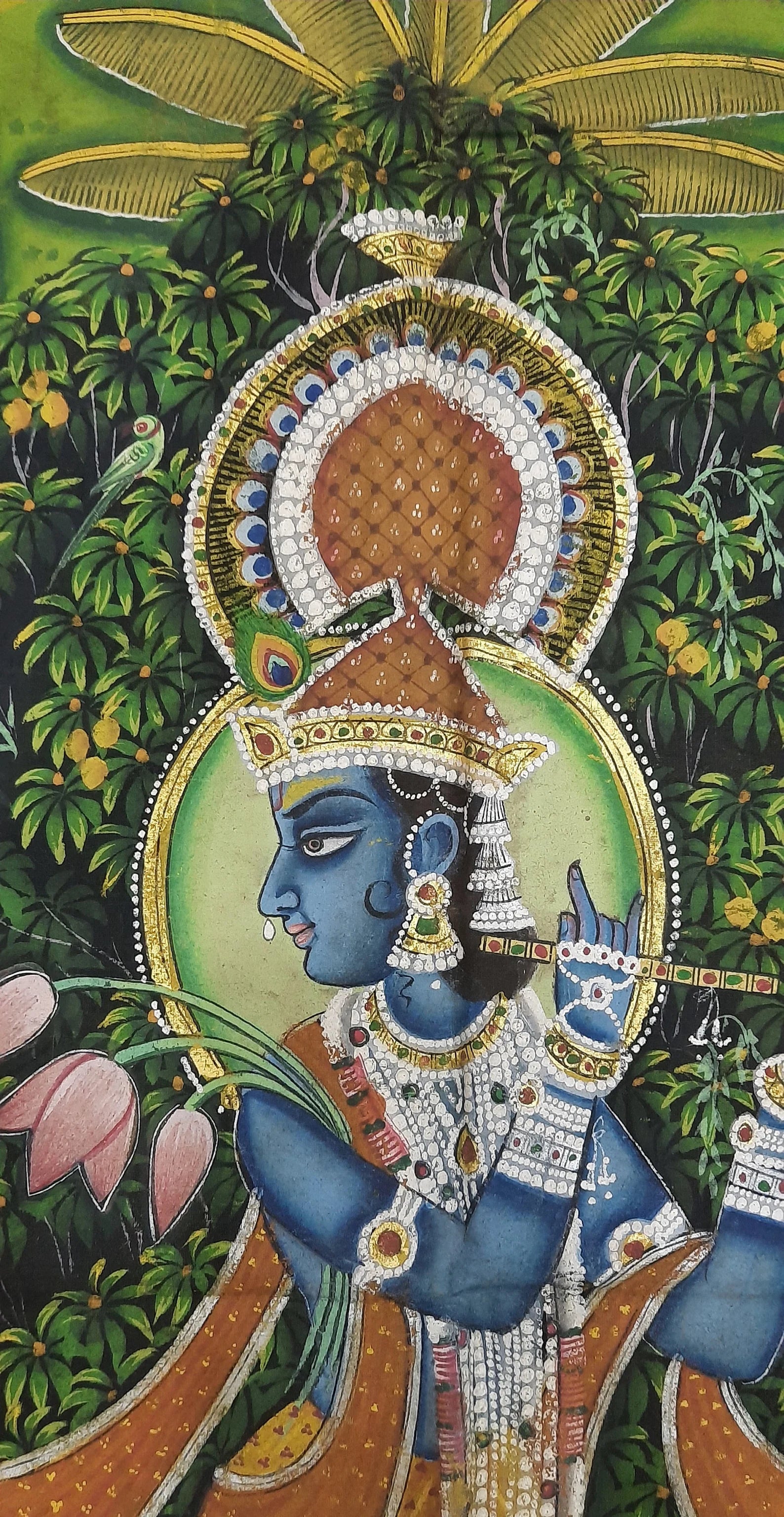 Detailed Pichwai painting of Lord Krishna on a lotus in classic Indian style