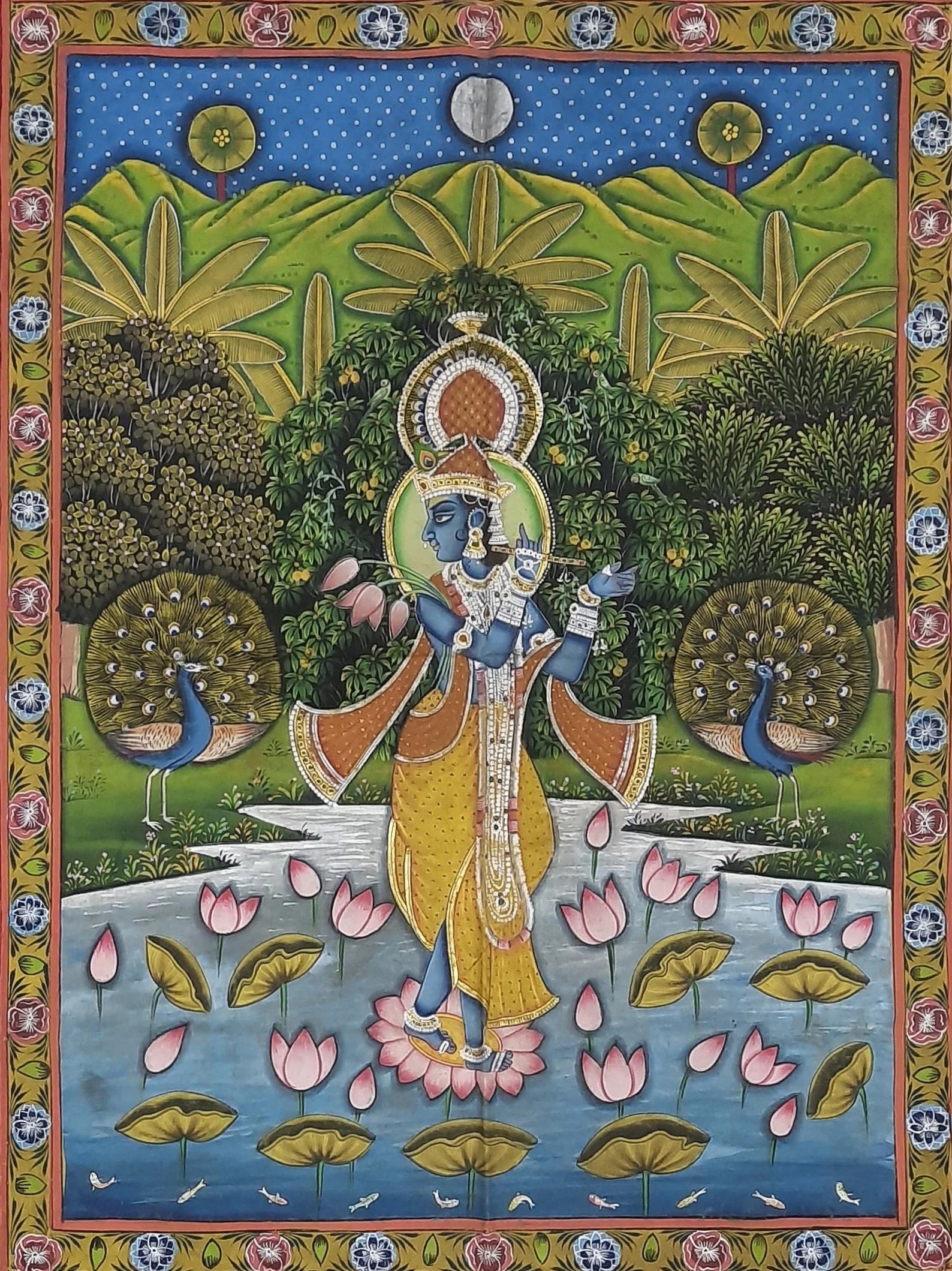 Traditional Pichwai painting showing Lord Krishna atop a lotus with rich detailing