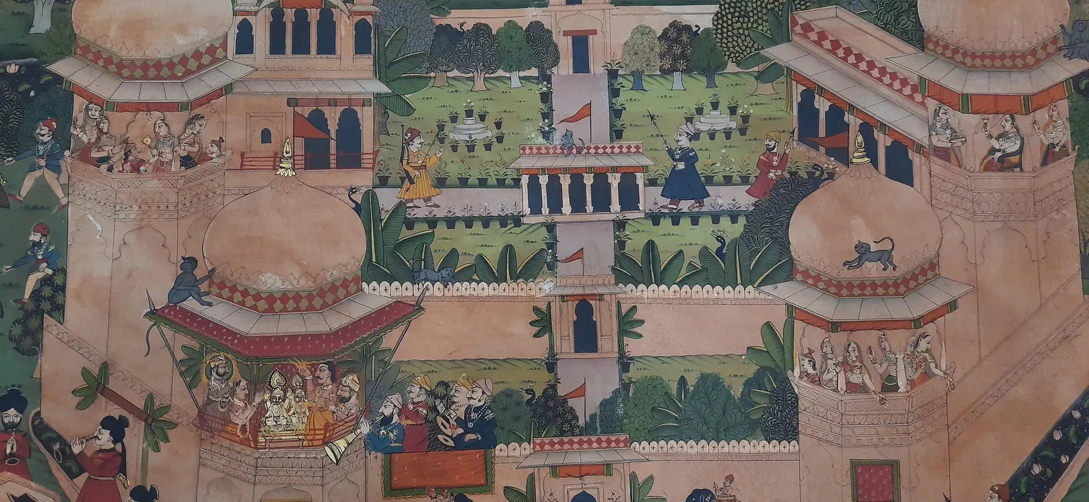 Traditional Indian miniature painting capturing a grand royal feast with palace architecture
