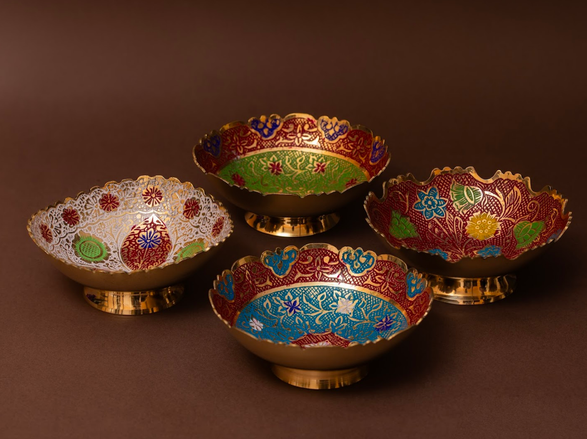 Set of four ornate bowls with floral patterns 