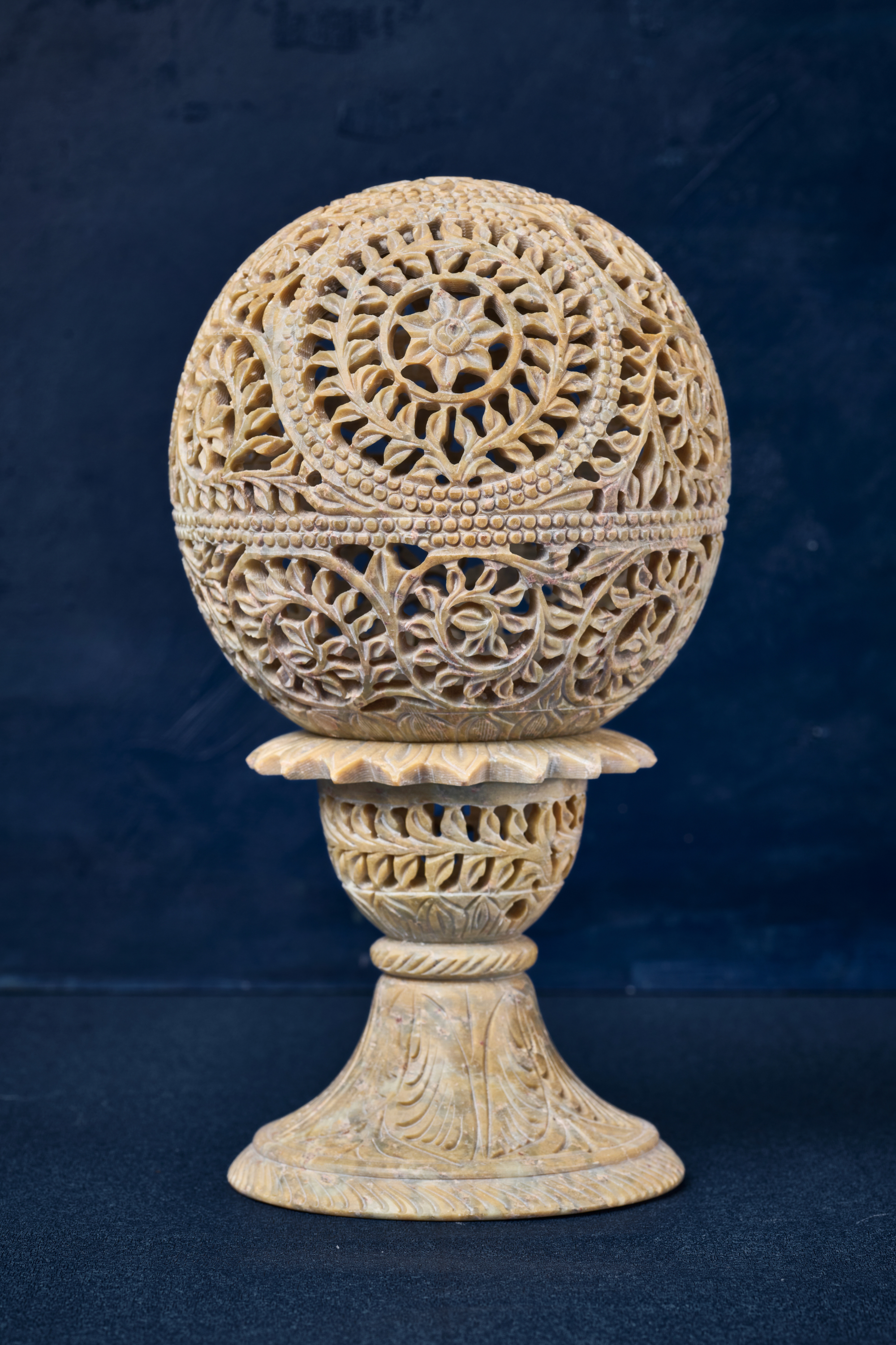 Intricate stone lampshade with a beige finish, crafted to add texture, warmth, and artisanal charm to interiors