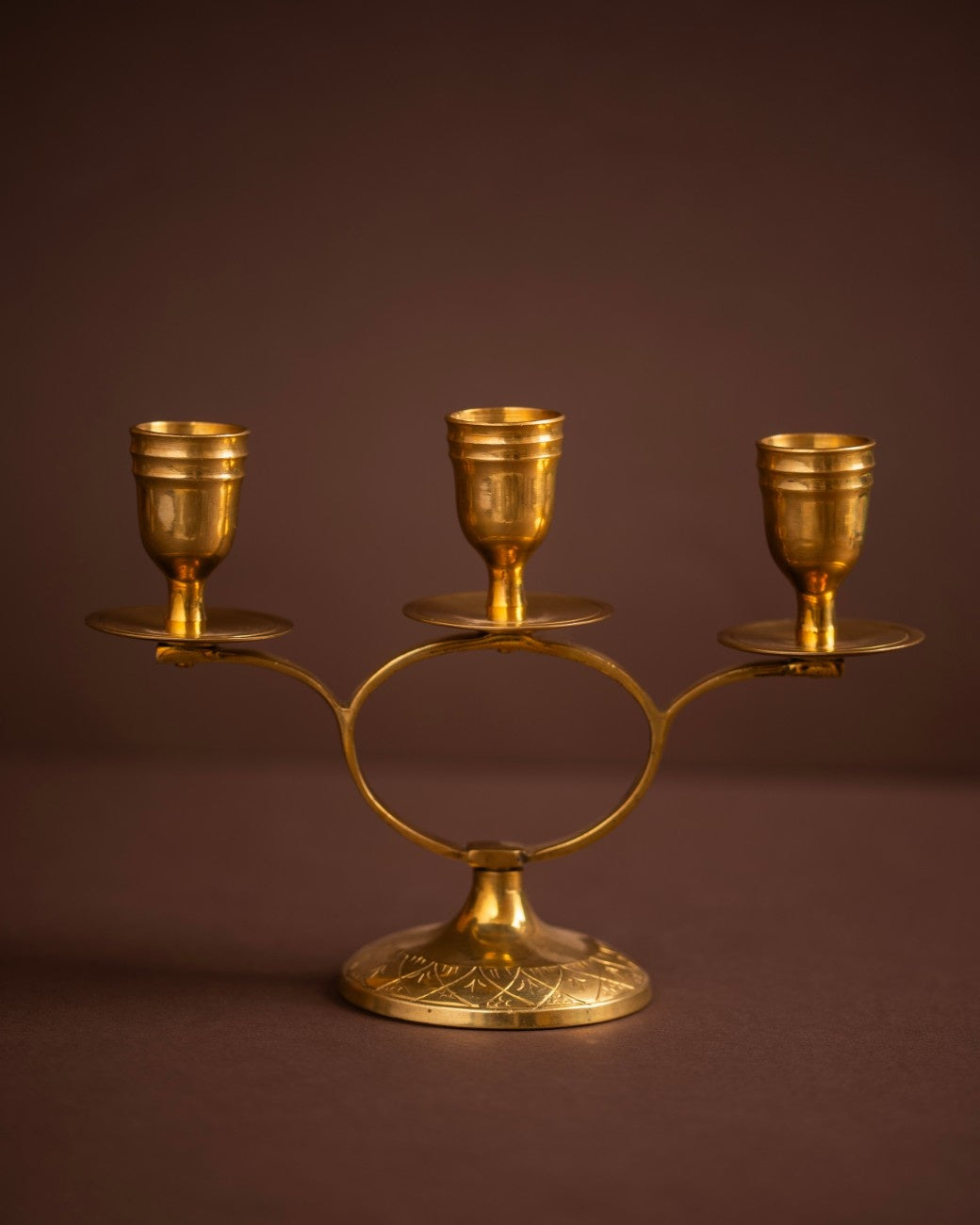 Brass triple candelabra holder