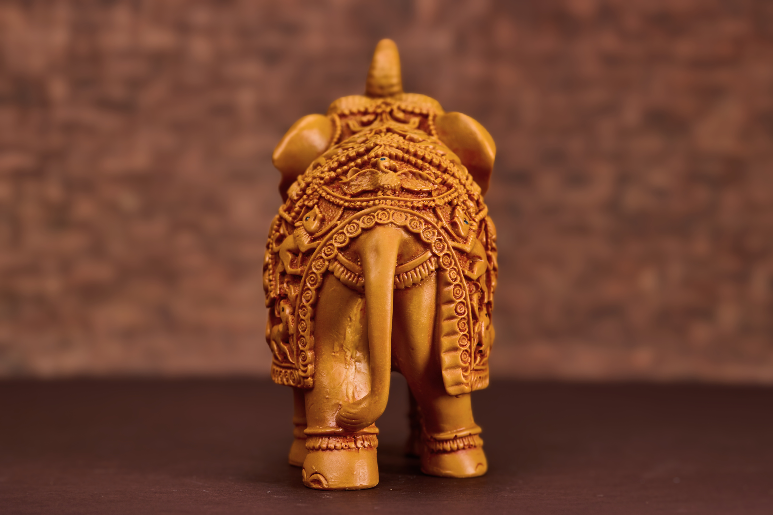 Decorative wooden regal elephant designed to bring prosperity, stability, and classic charm to interiors