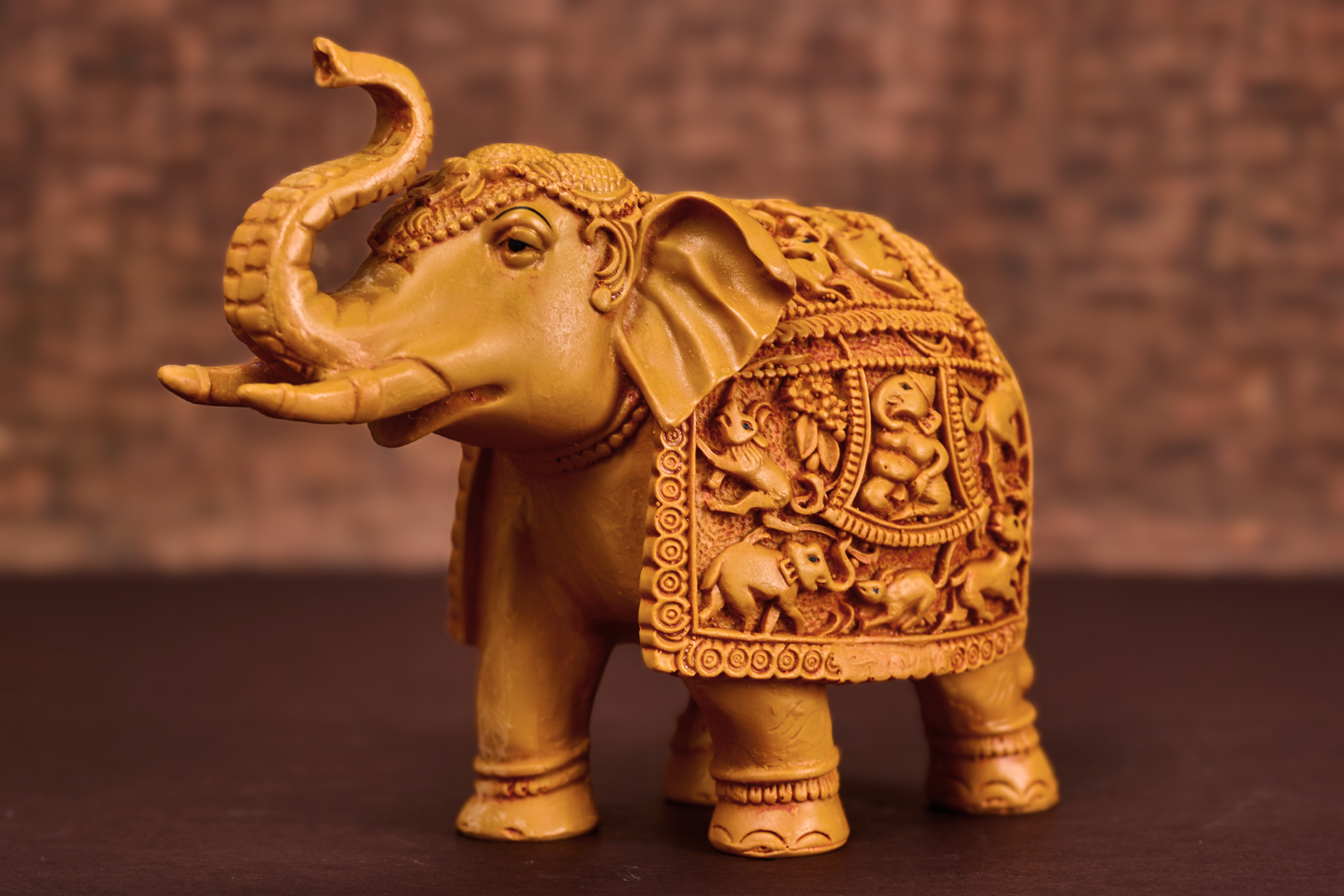 Hand carved wooden regal elephant sculpture symbolizing strength, wisdom, and royal elegance for refined home décor